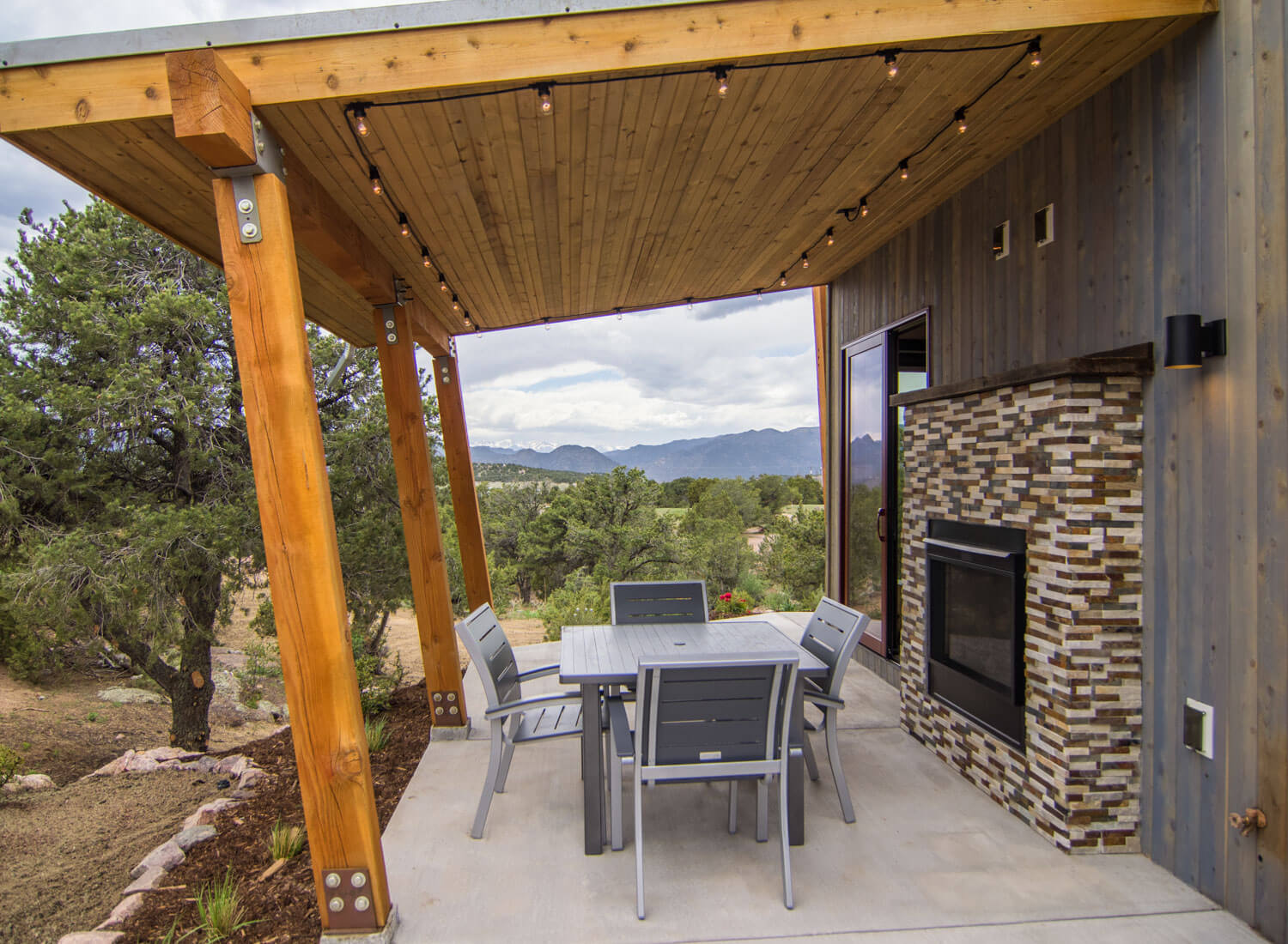 Patio and fireplace of cabin at Royal Gorge Cabins